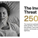 A person waking up with jaw soreness from teeth grinding.